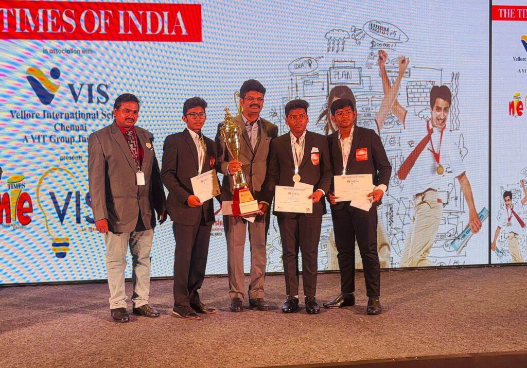 Students receiving certificates during a Times of India event at Sir C.R. Reddy School