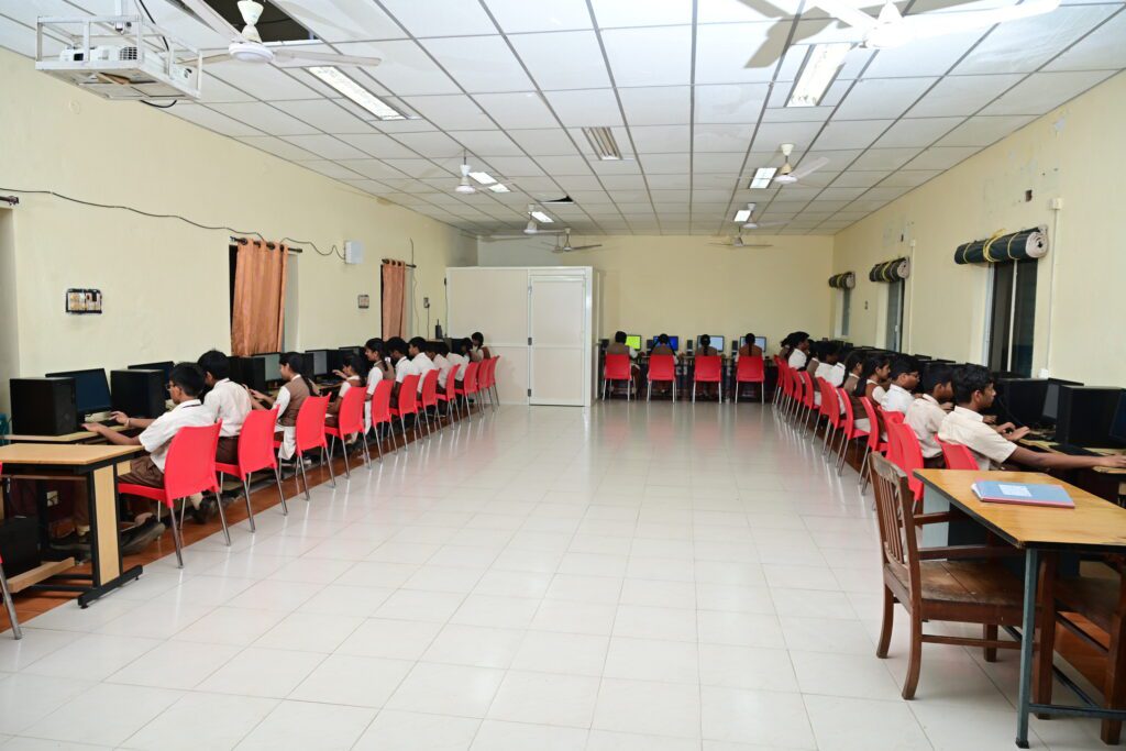 Students learning in the computer lab at Sir C.R. Reddy School
