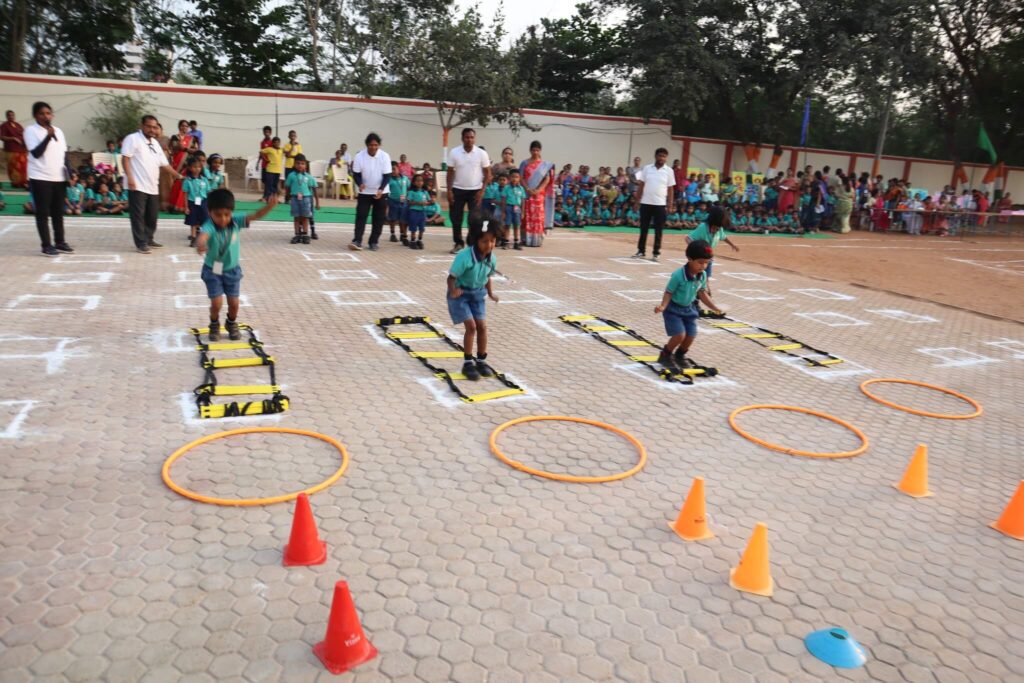 Kids engaging in outdoor activities on the playground at Sir C.R. Reddy School